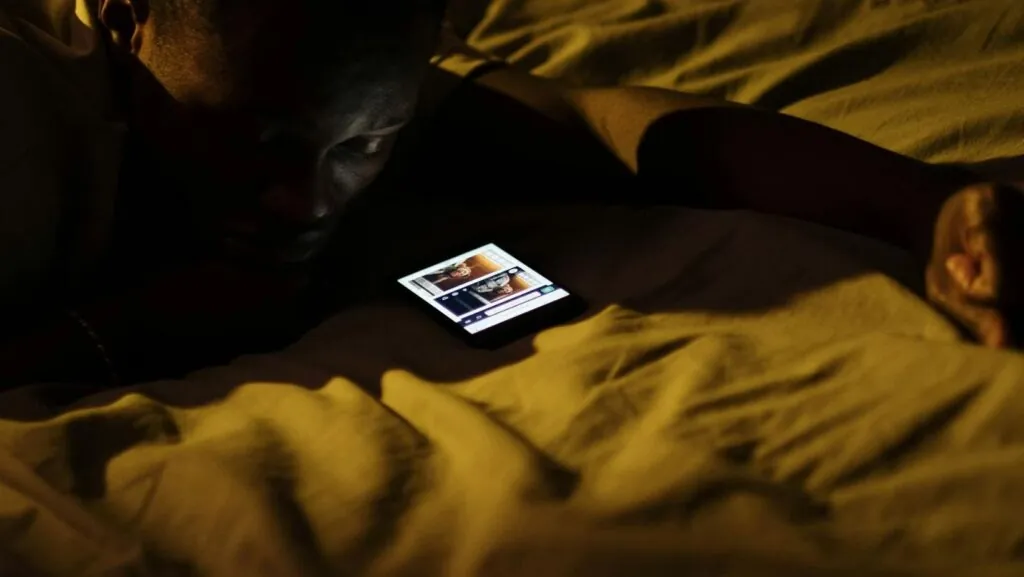 A Man Fell Asleep while Using His Mobile Phone